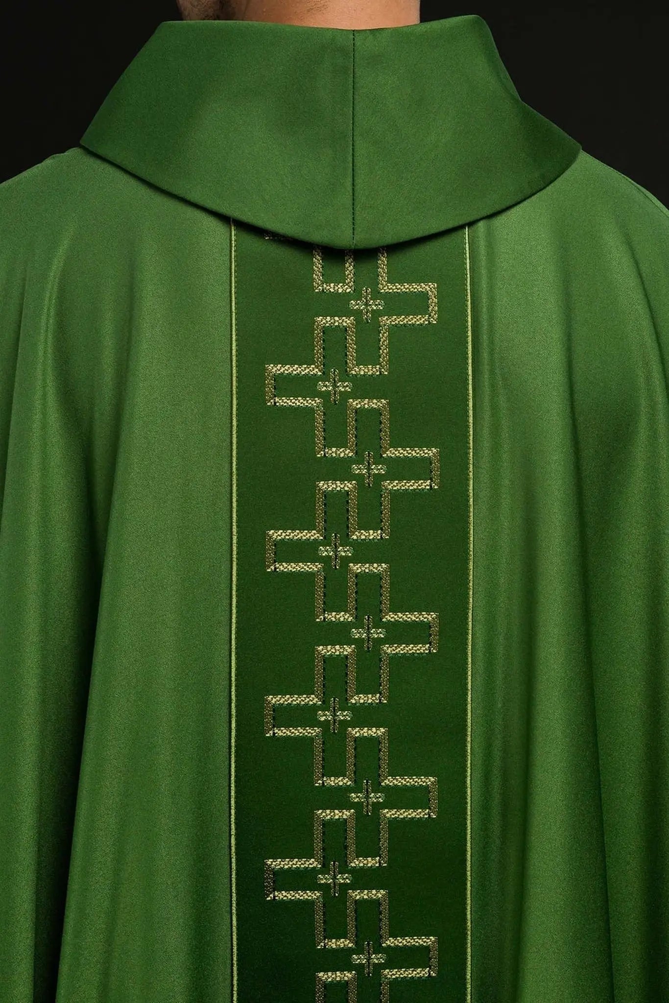 Chasuble with richly embroidered belt in cross embroidery in green