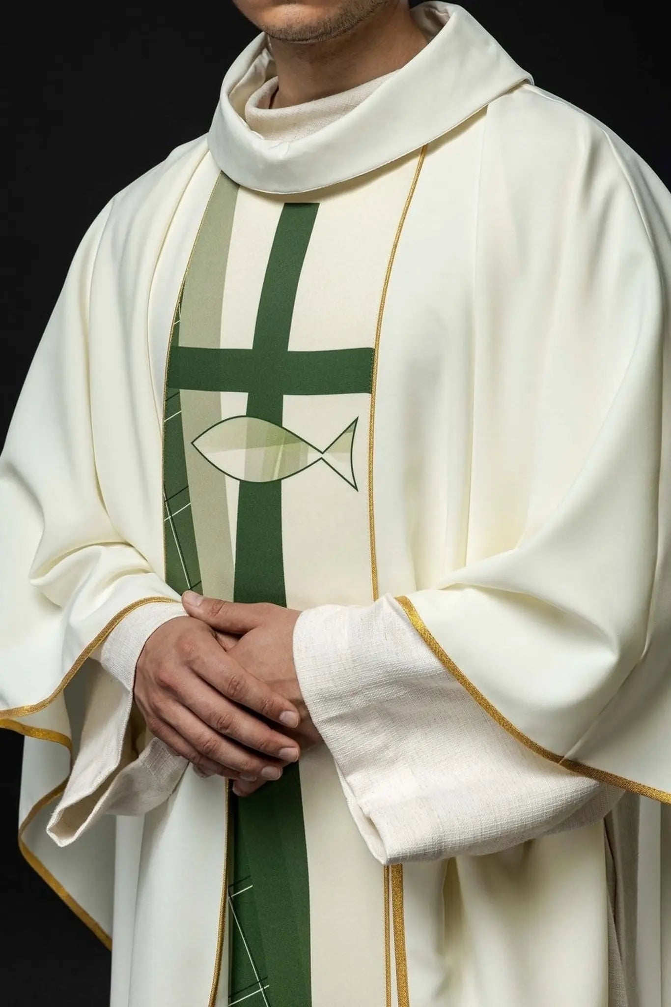 White chasuble embroidered with cross and fish pattern