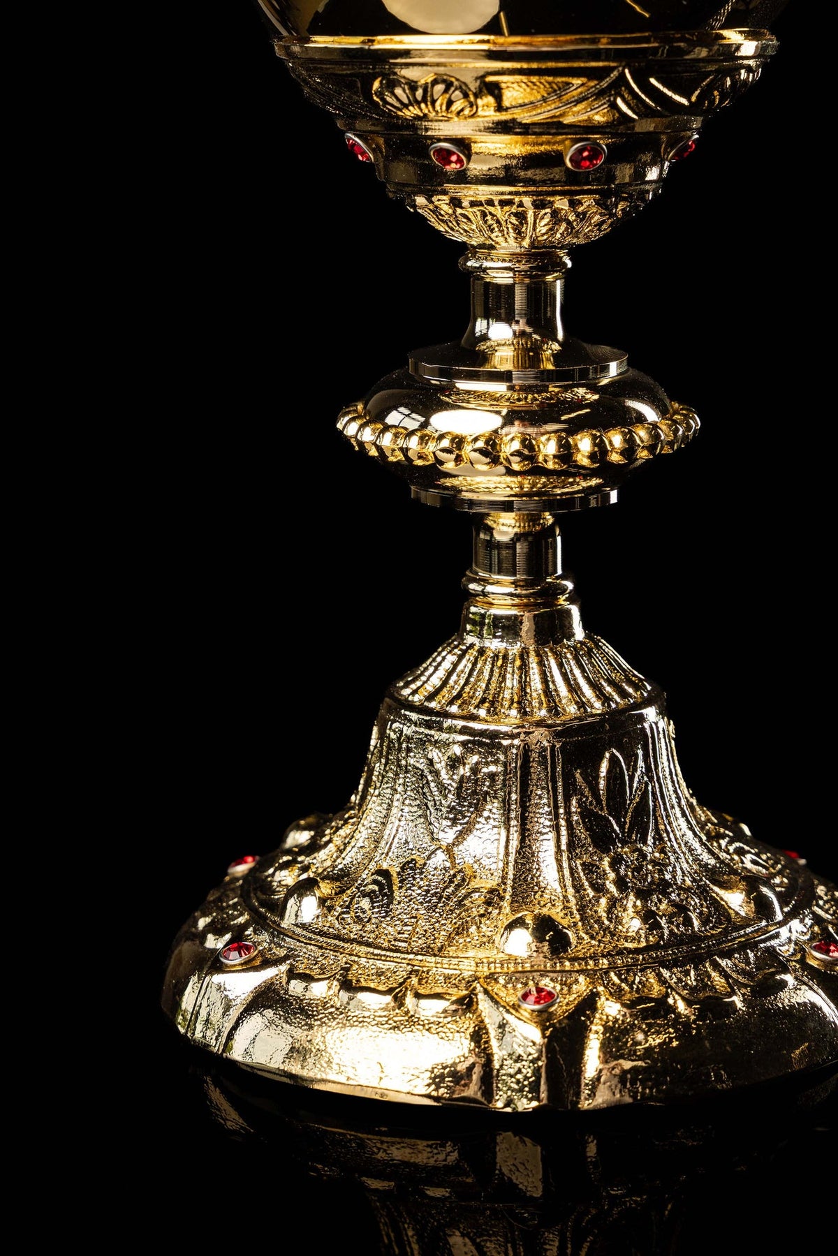 Gold-plated chalice with Baroque plant motifs and faux rubies, lower bowl close-up