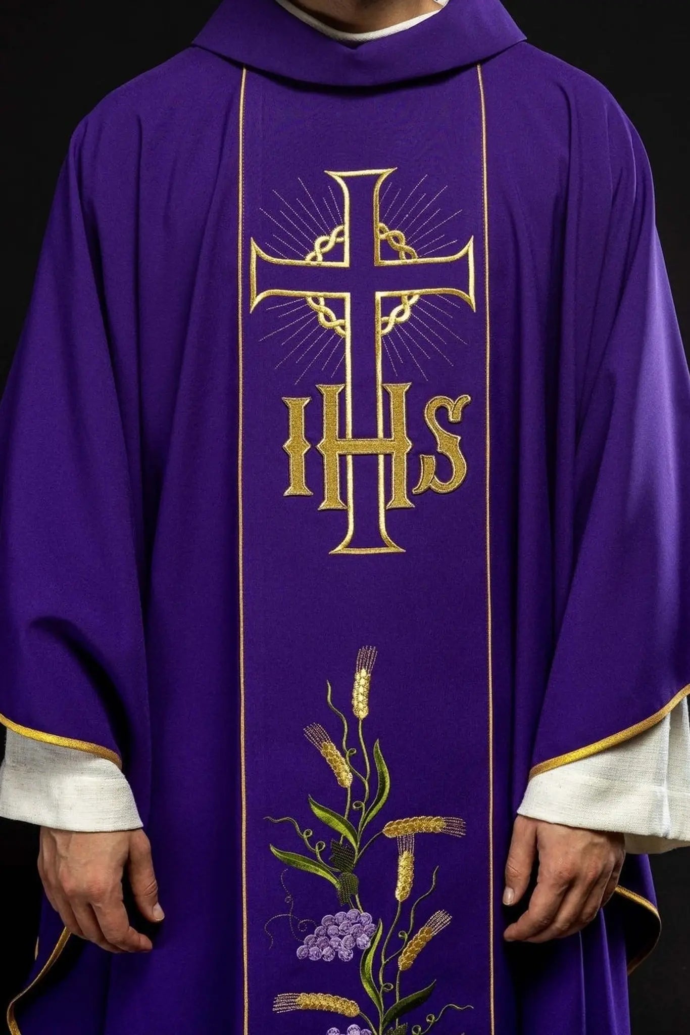 Purple chasuble with decorated gold belt with IHS and ears