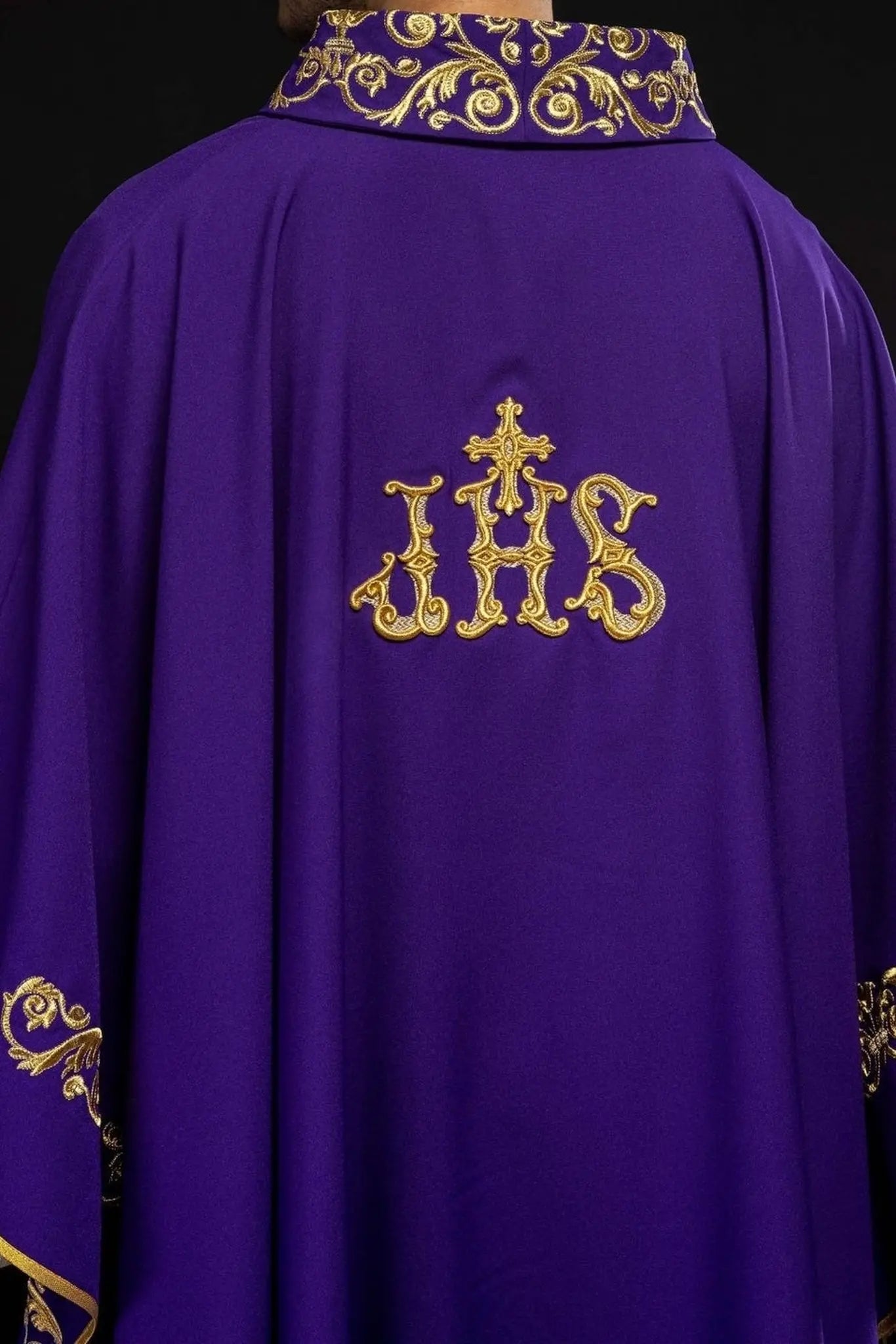 Purple chasuble with gold IHS embroidery and decorative trim