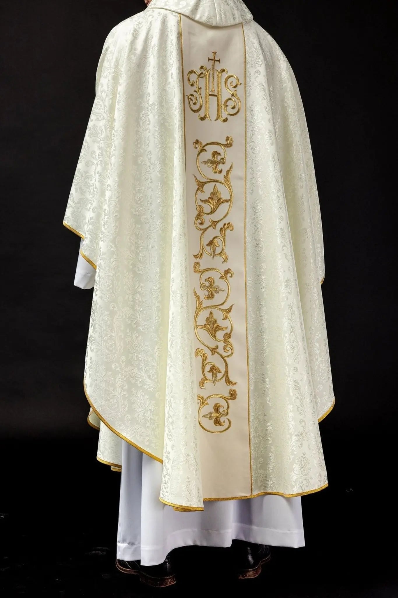 Ecru liturgical chasuble with richly decorated IHS belt