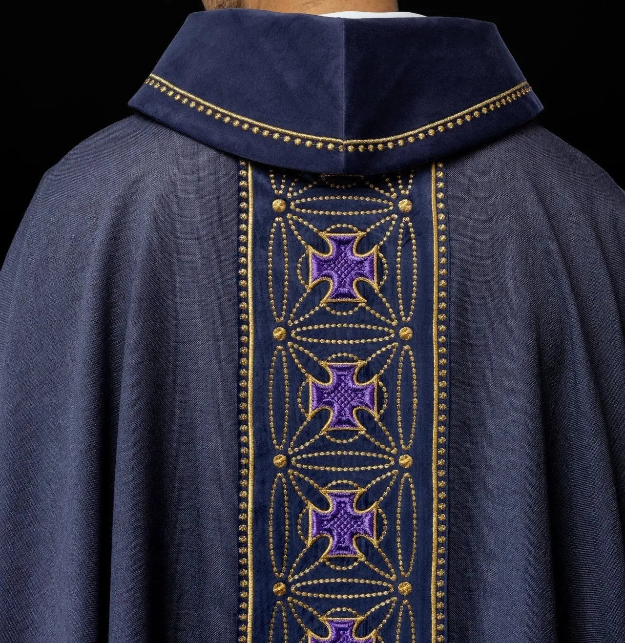 Liturgical chasuble with richly decorated belt with crosses in purple color