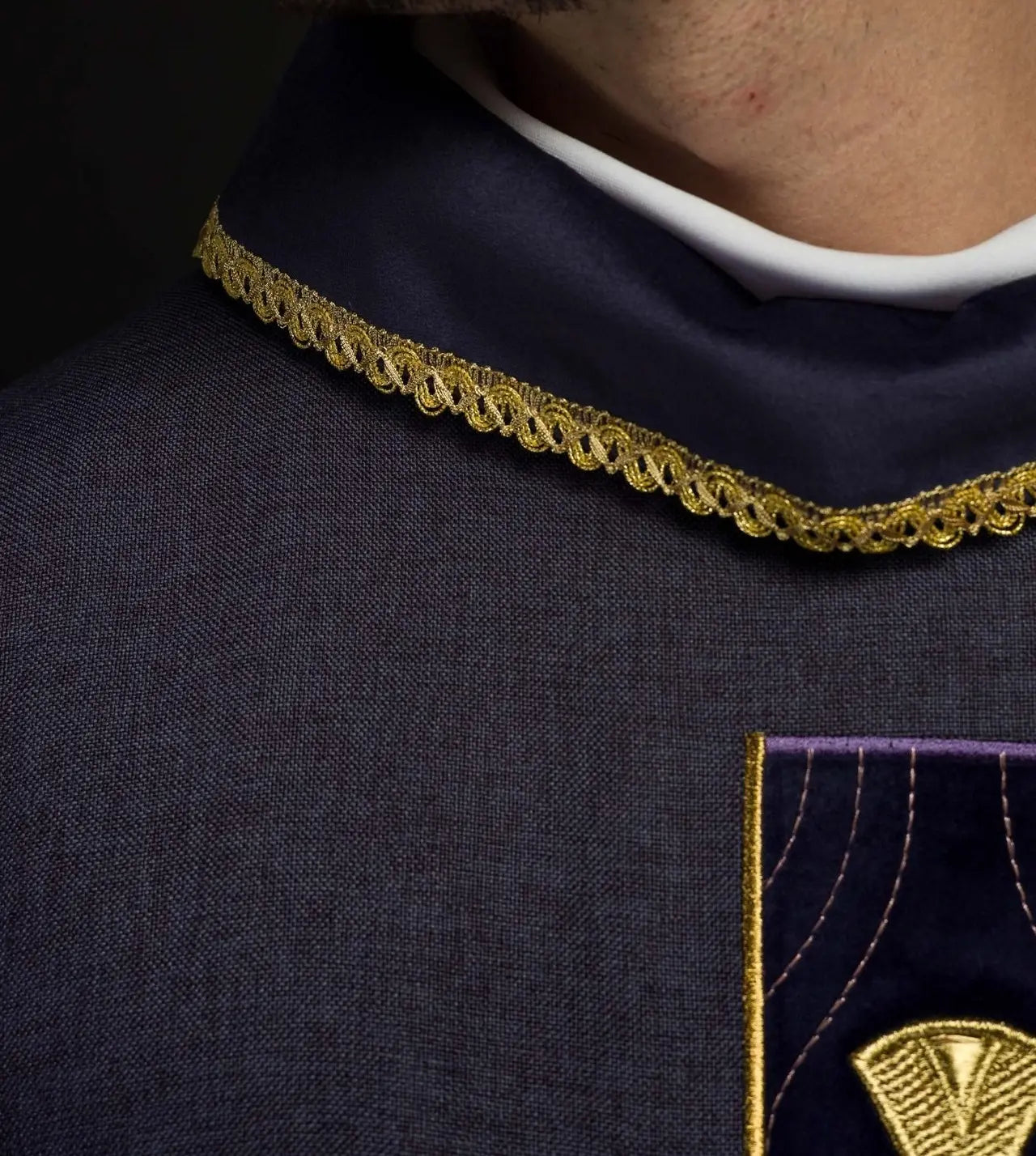 Chasuble in embroidered gold crosses and piping on collar in purple