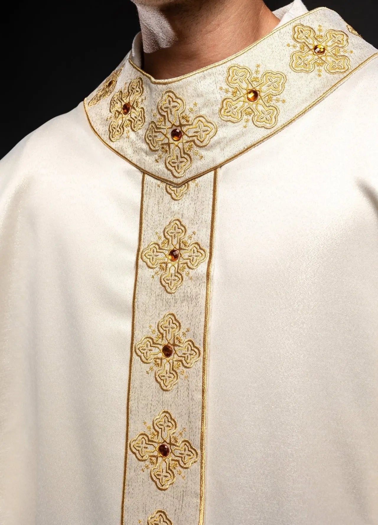 Chasuble in ecru color with embroidered belt and collar decorated with stones