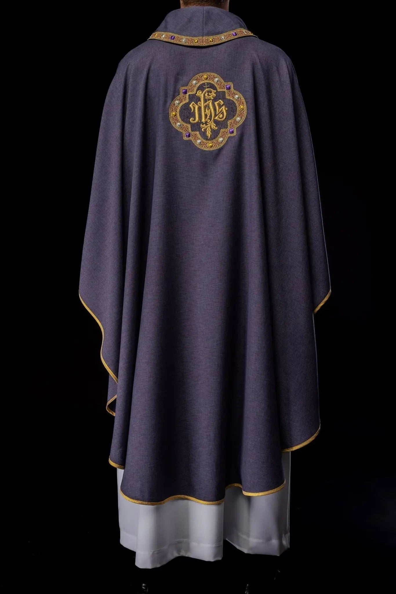 Chasuble with richly embroidered belt and piping around IHS I collar embroidery in purple color