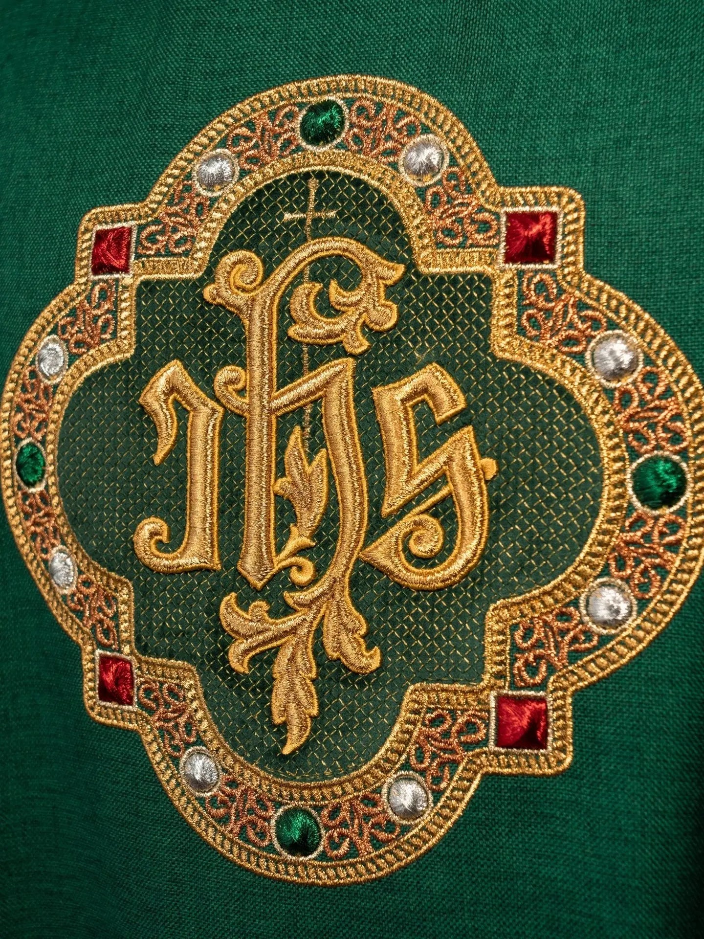 Chasuble with richly embroidered belt and piping around the IHS I collar embroidery in green