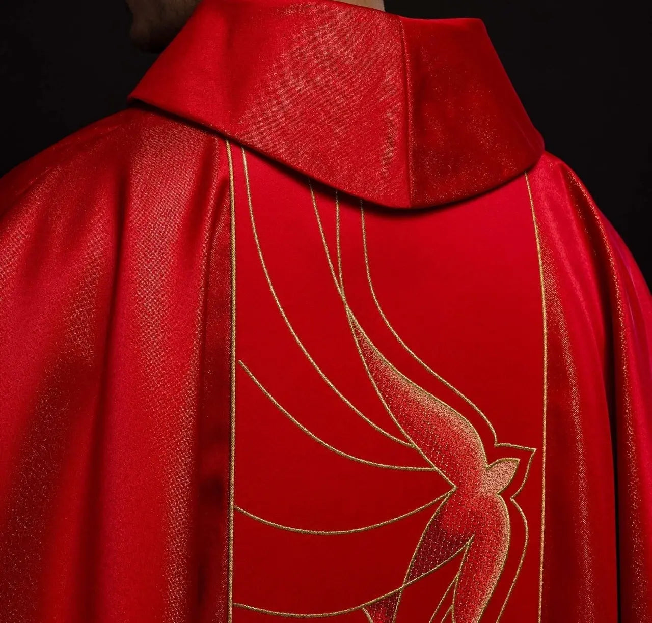 Chasuble of shiny fabric richly embroidered in red