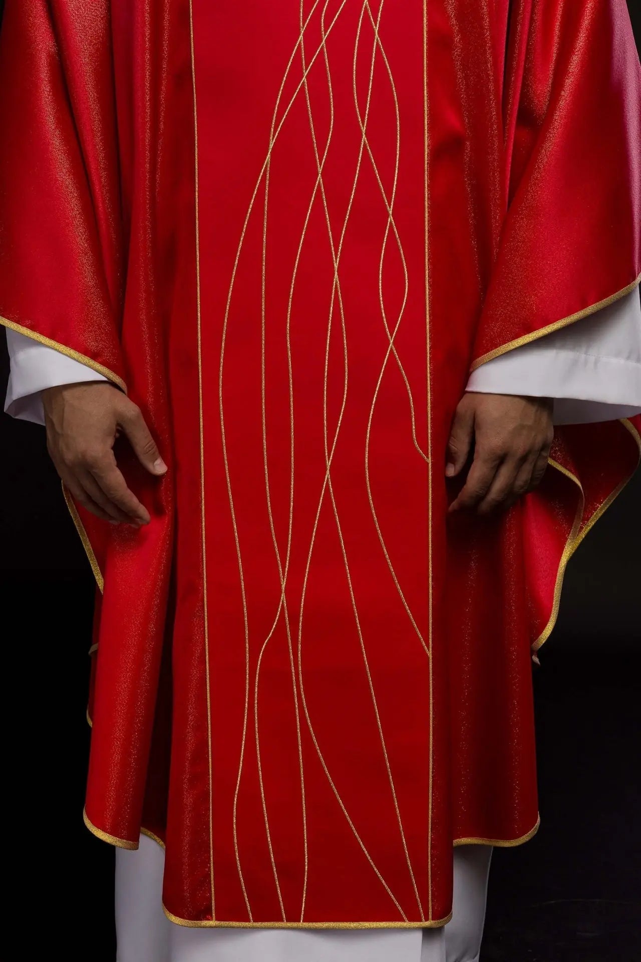 Chasuble of shiny fabric richly embroidered in red