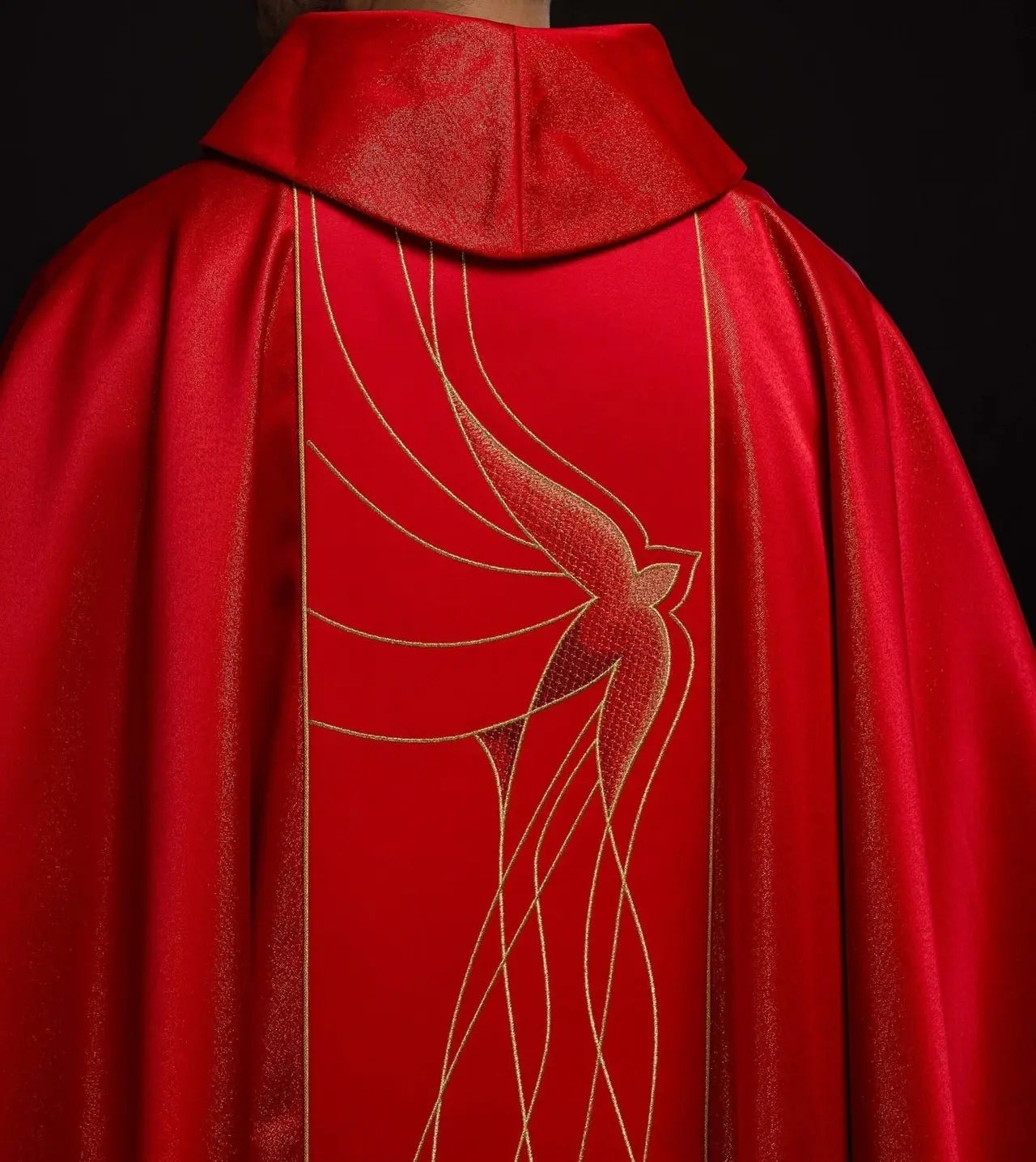Chasuble of shiny fabric richly embroidered in red