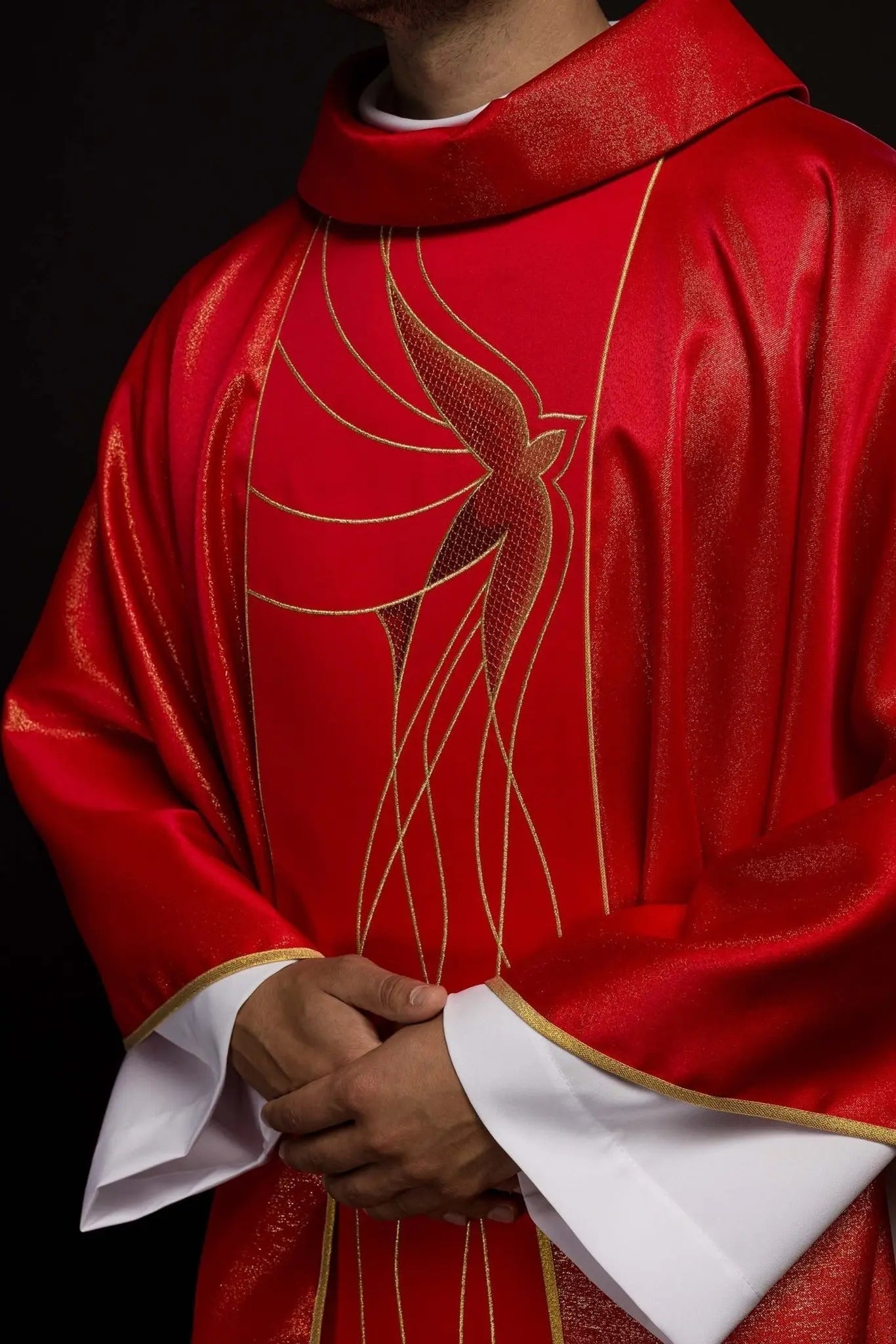 Chasuble of shiny fabric richly embroidered in red