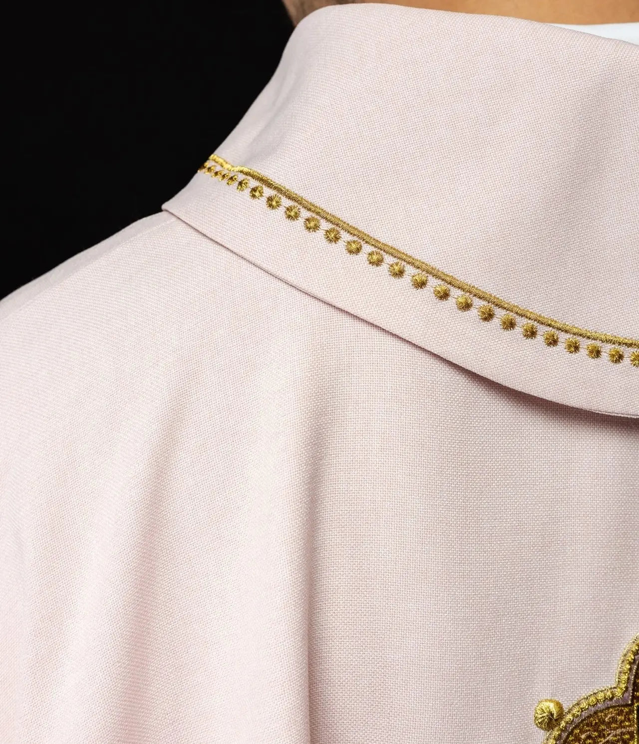 Chasuble with embroidered cross and gold trim on collar in rose color