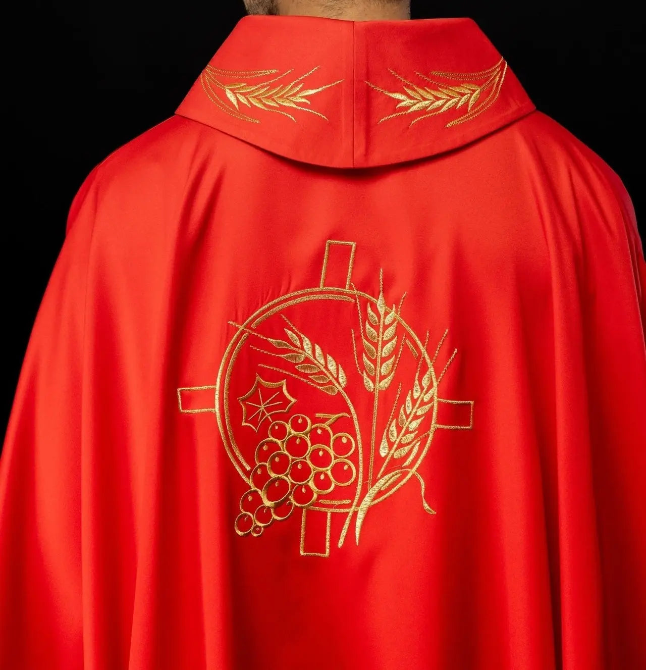 Chasuble with embroidered cross and red ear motifs
