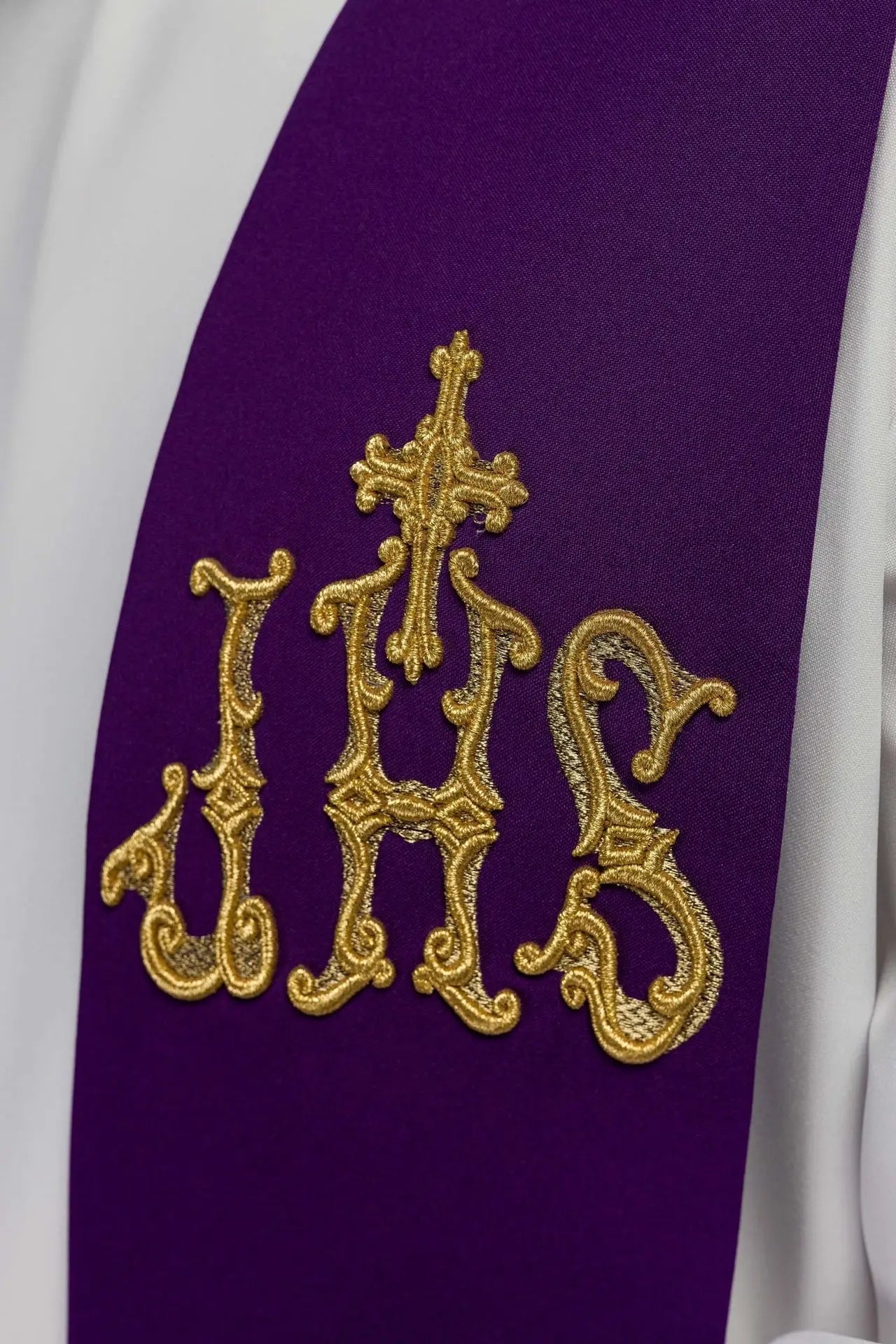 Purple priest's stole embroidered with cross and IHS