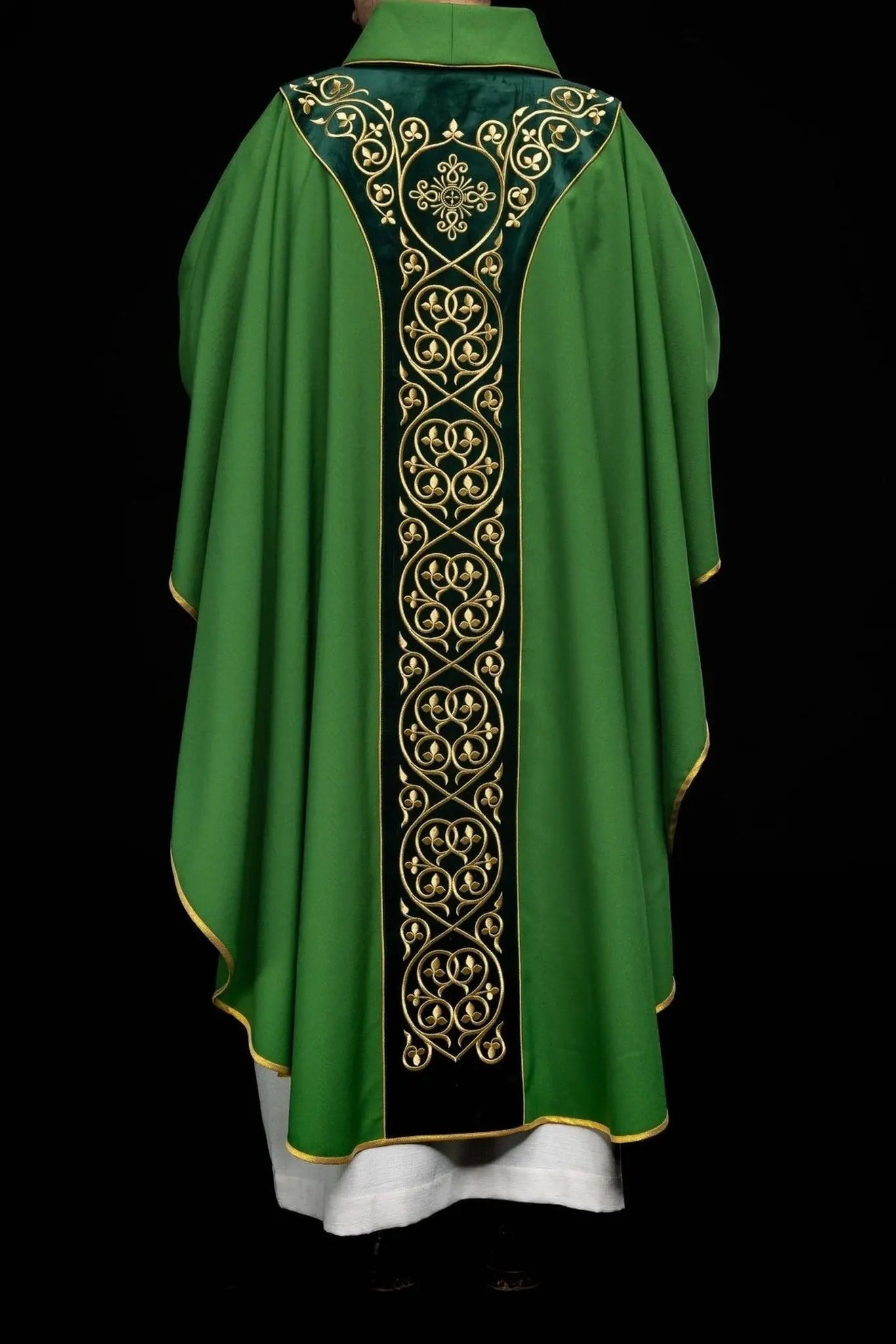 Green liturgical chasuble decorated with embroidery on velvet