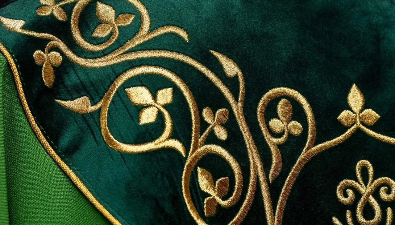Green liturgical chasuble decorated with embroidery on velvet