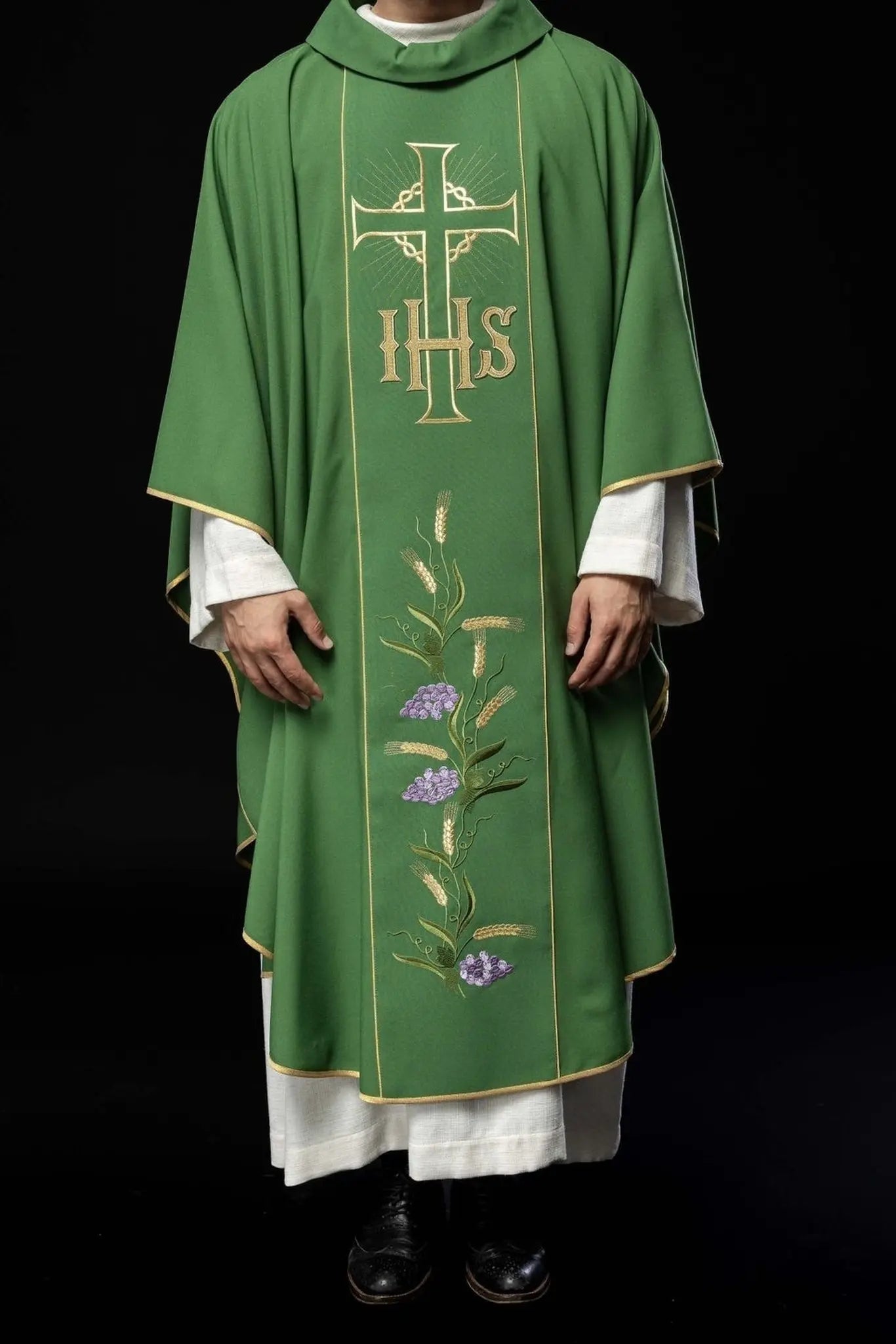 Green chasuble with decorated gold belt with IHS and ears