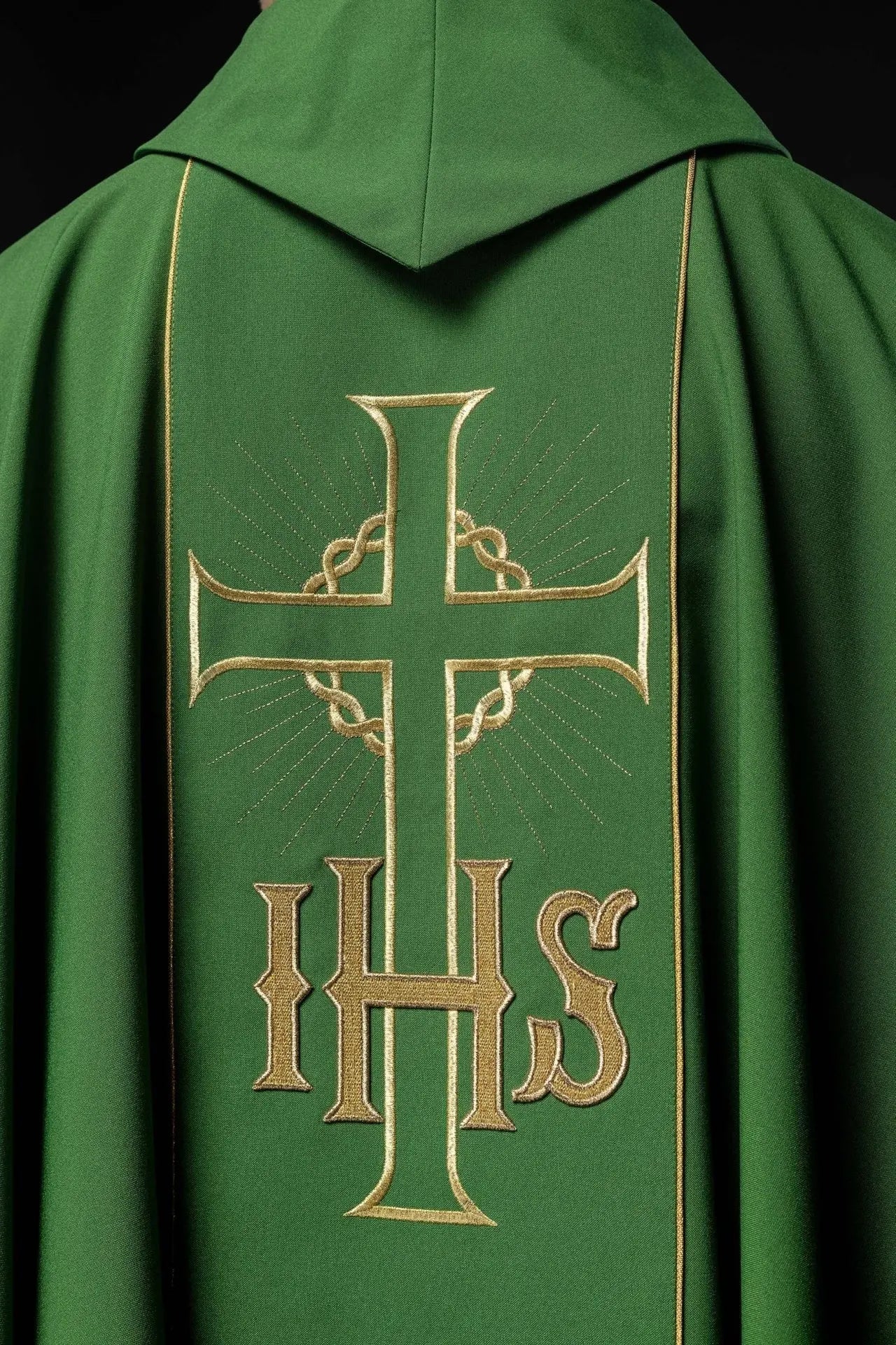 Green chasuble with decorated gold belt with IHS and ears