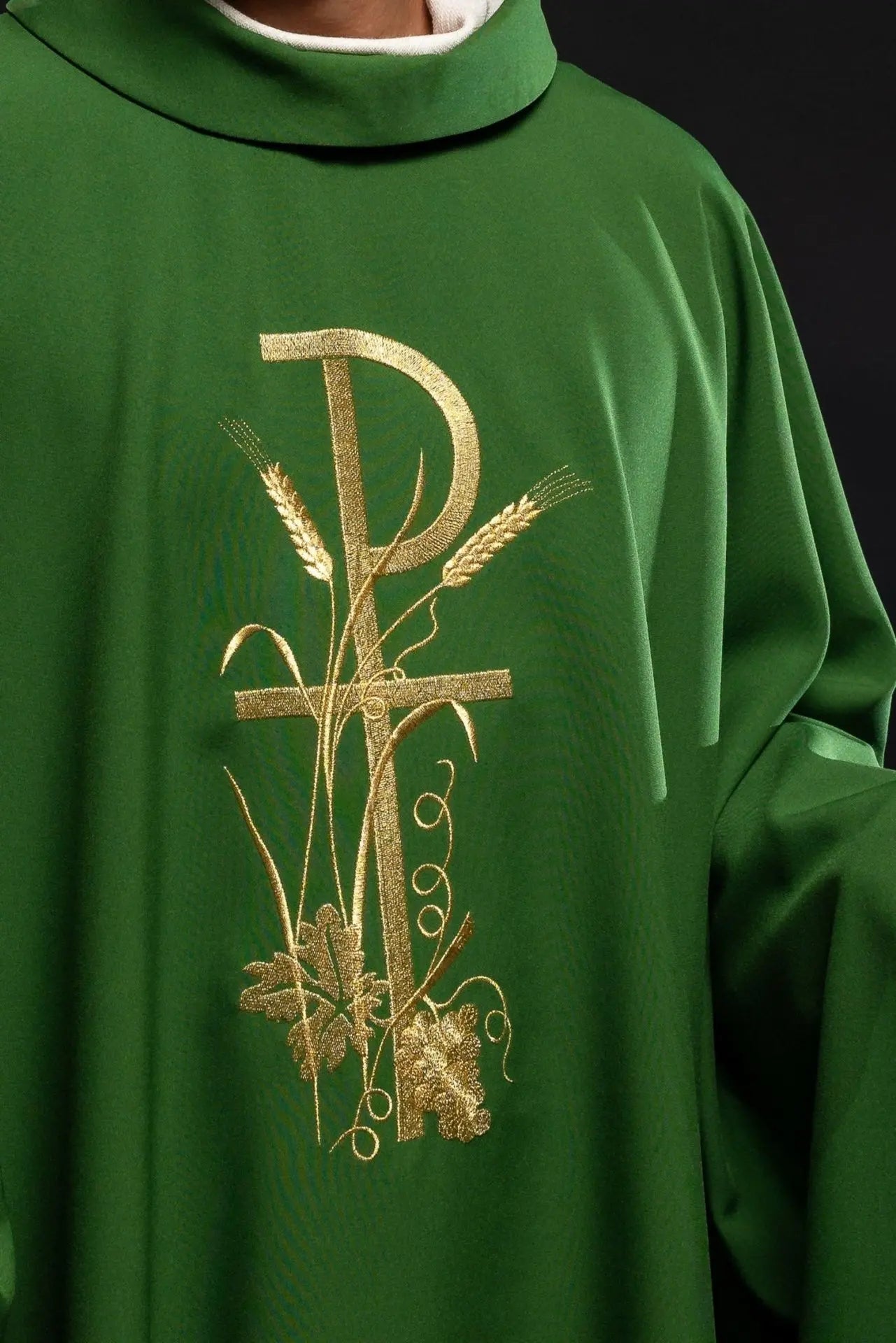 Green chasuble with gold cross embroidery