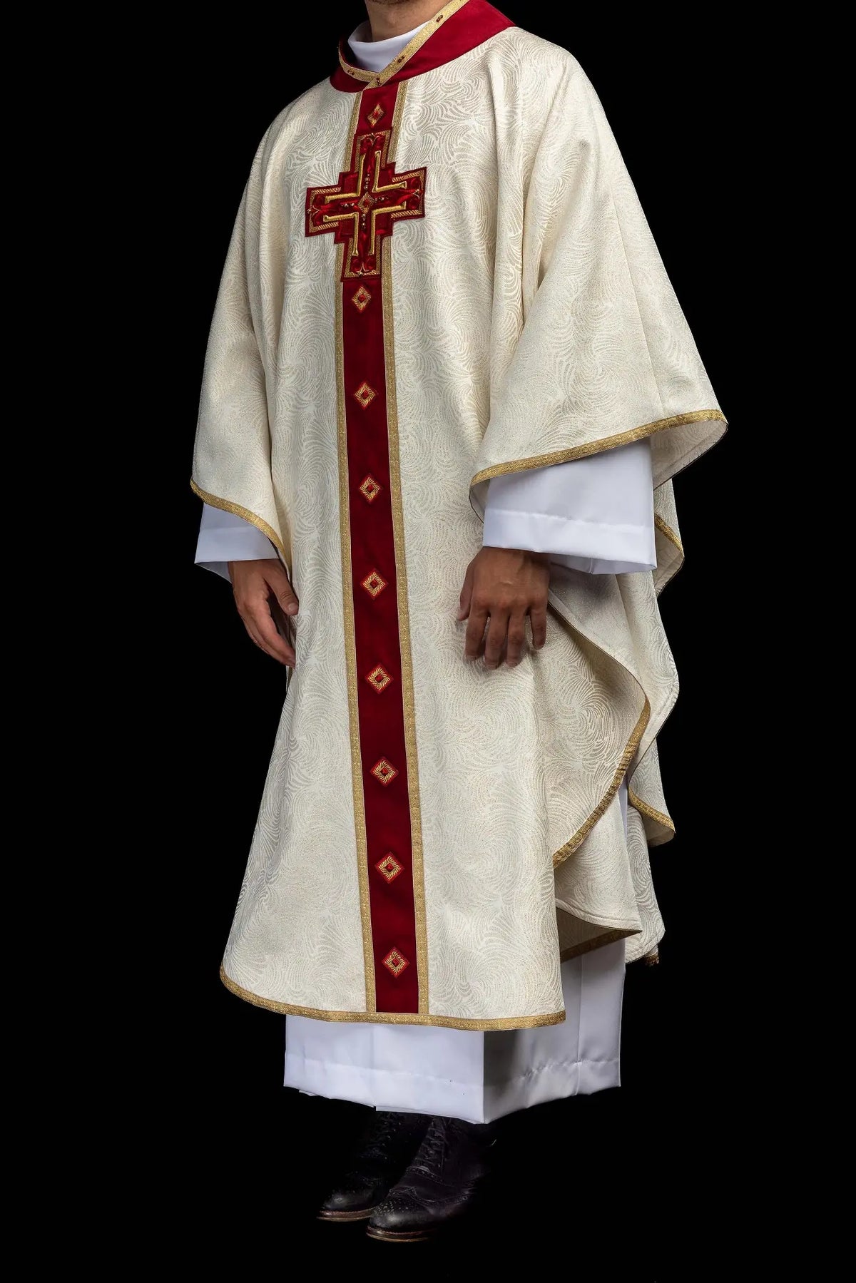 Ecru Easter chasuble with an embroidered cross, front worn view