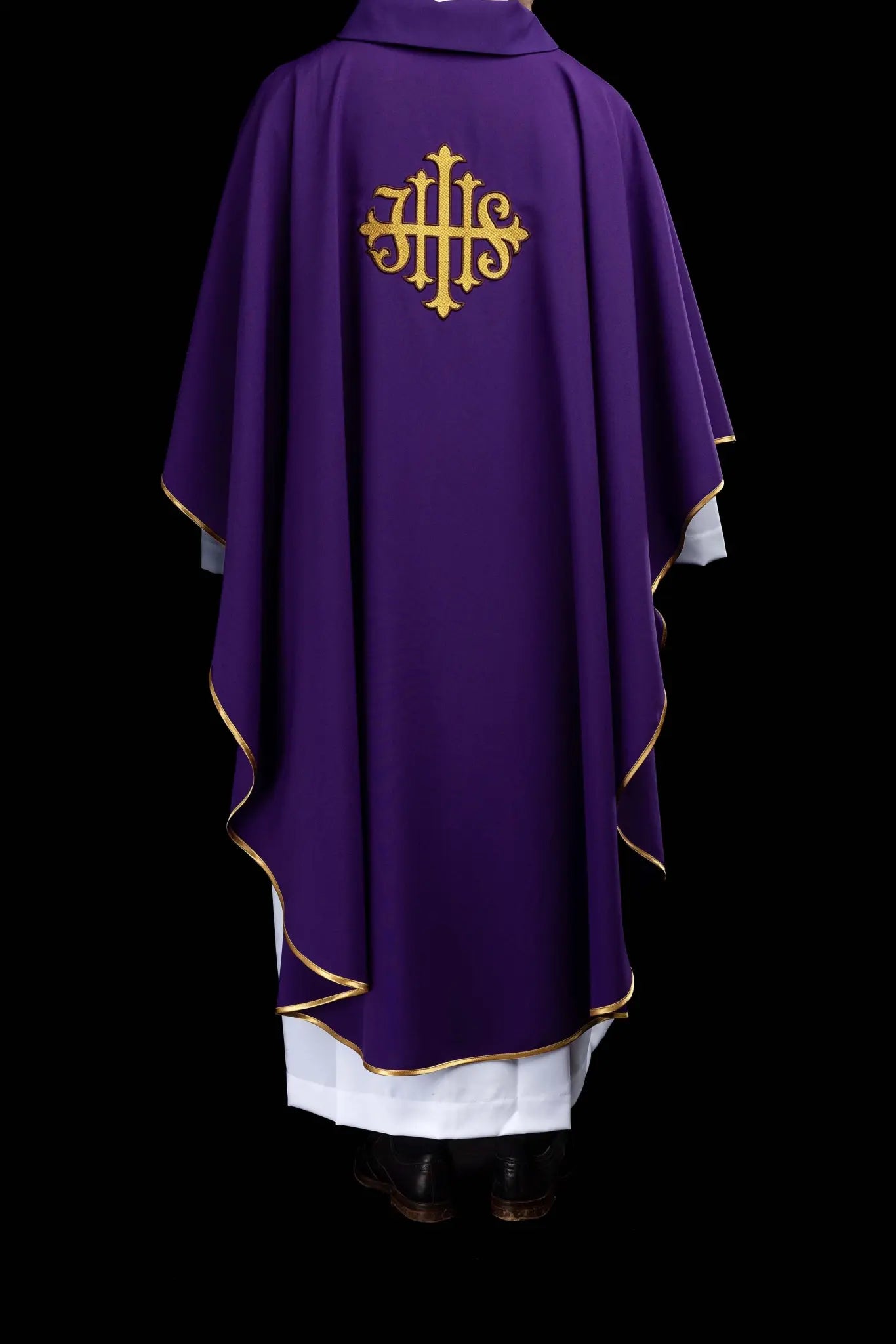 Purple chasuble with embroidered IHS symbol and gold trim, featuring a V-neckline and a matching stole.