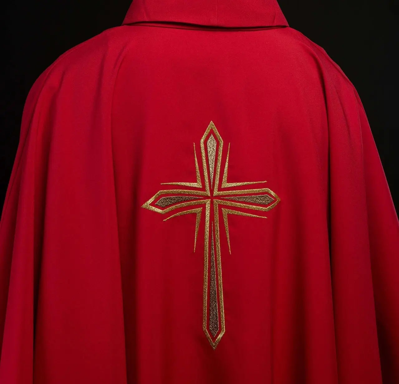 Red chasuble embroidered with cross design