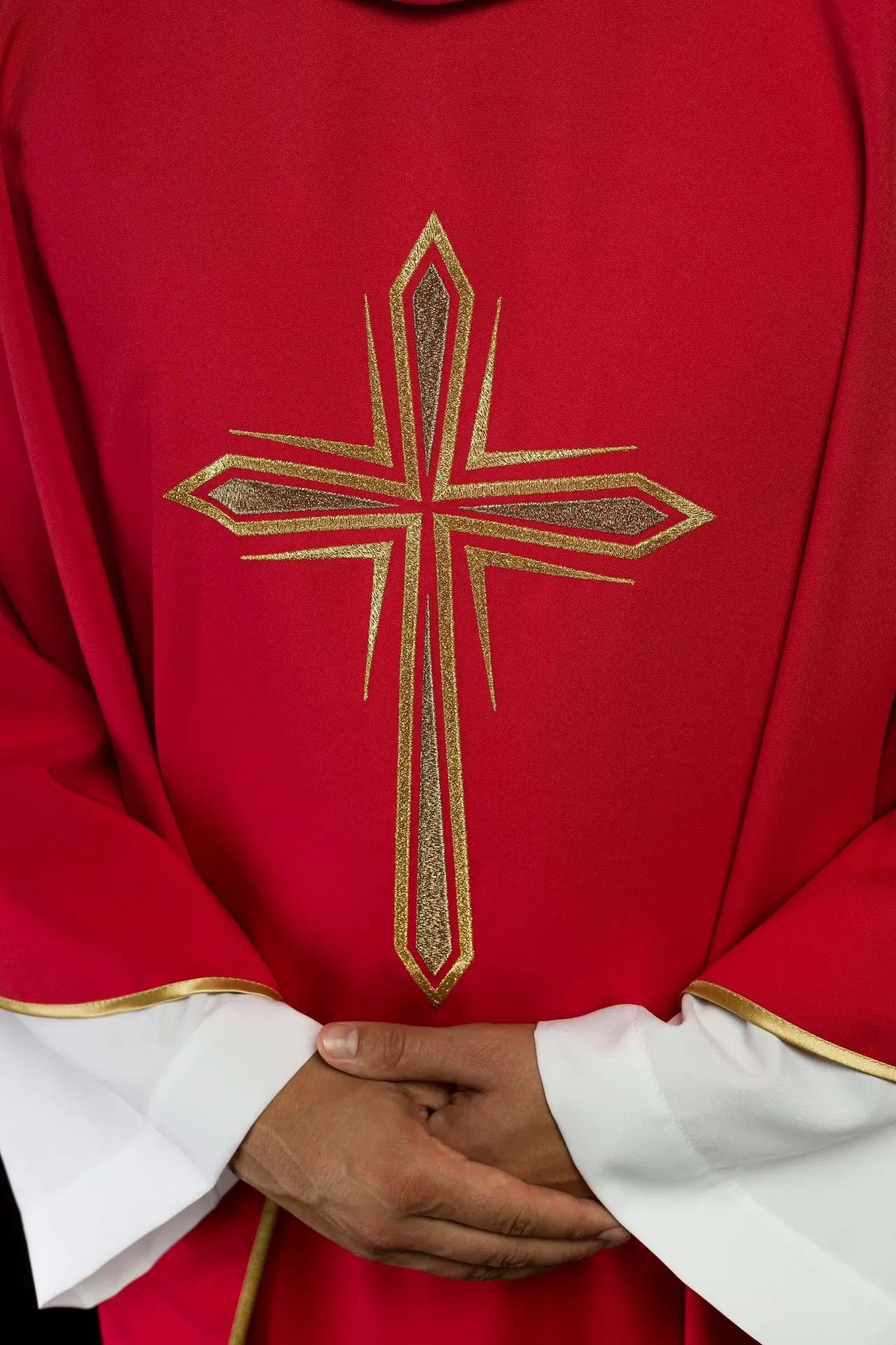 Red chasuble embroidered with cross design