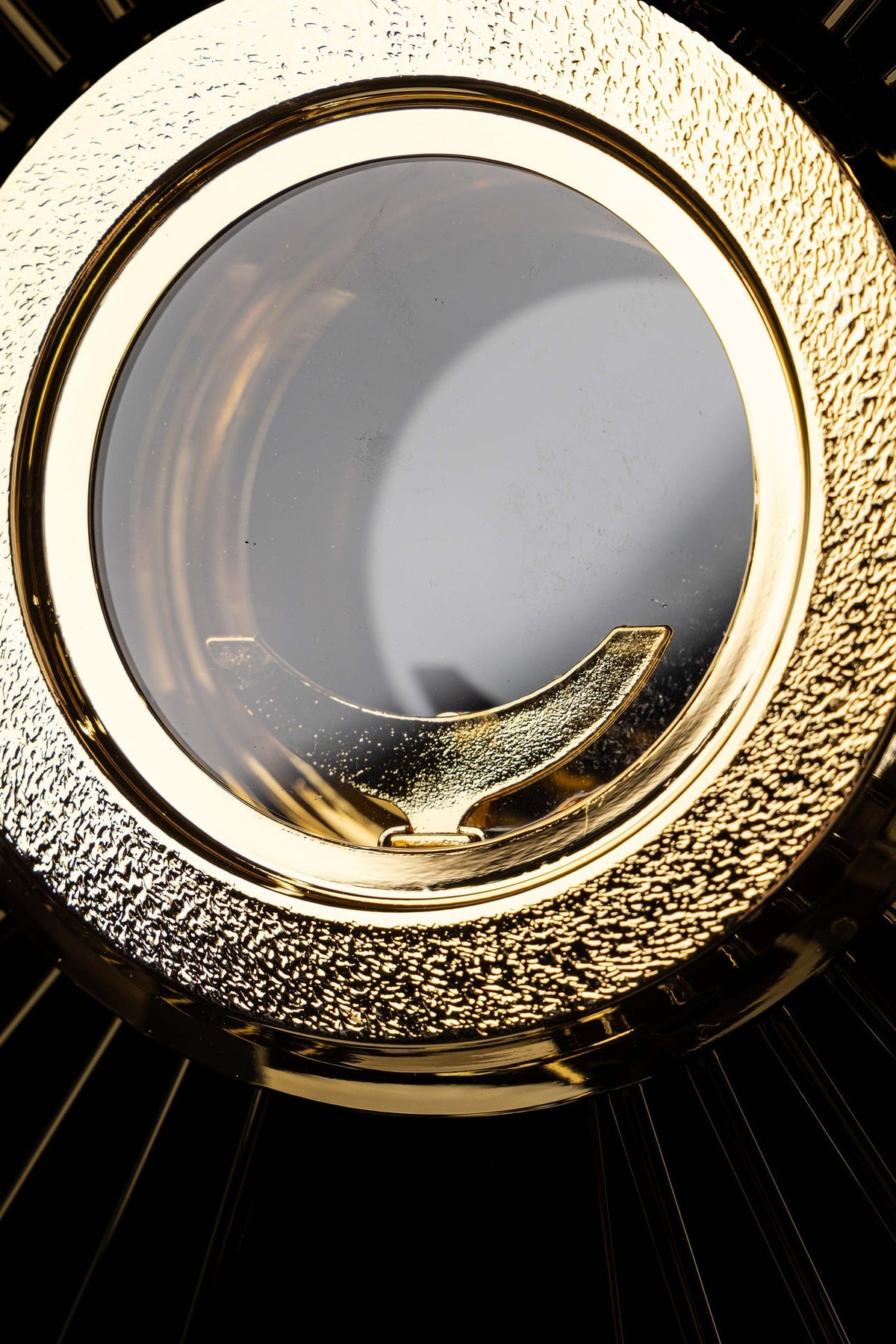 Gold-plated brass monstrance with cross and rays, center detail