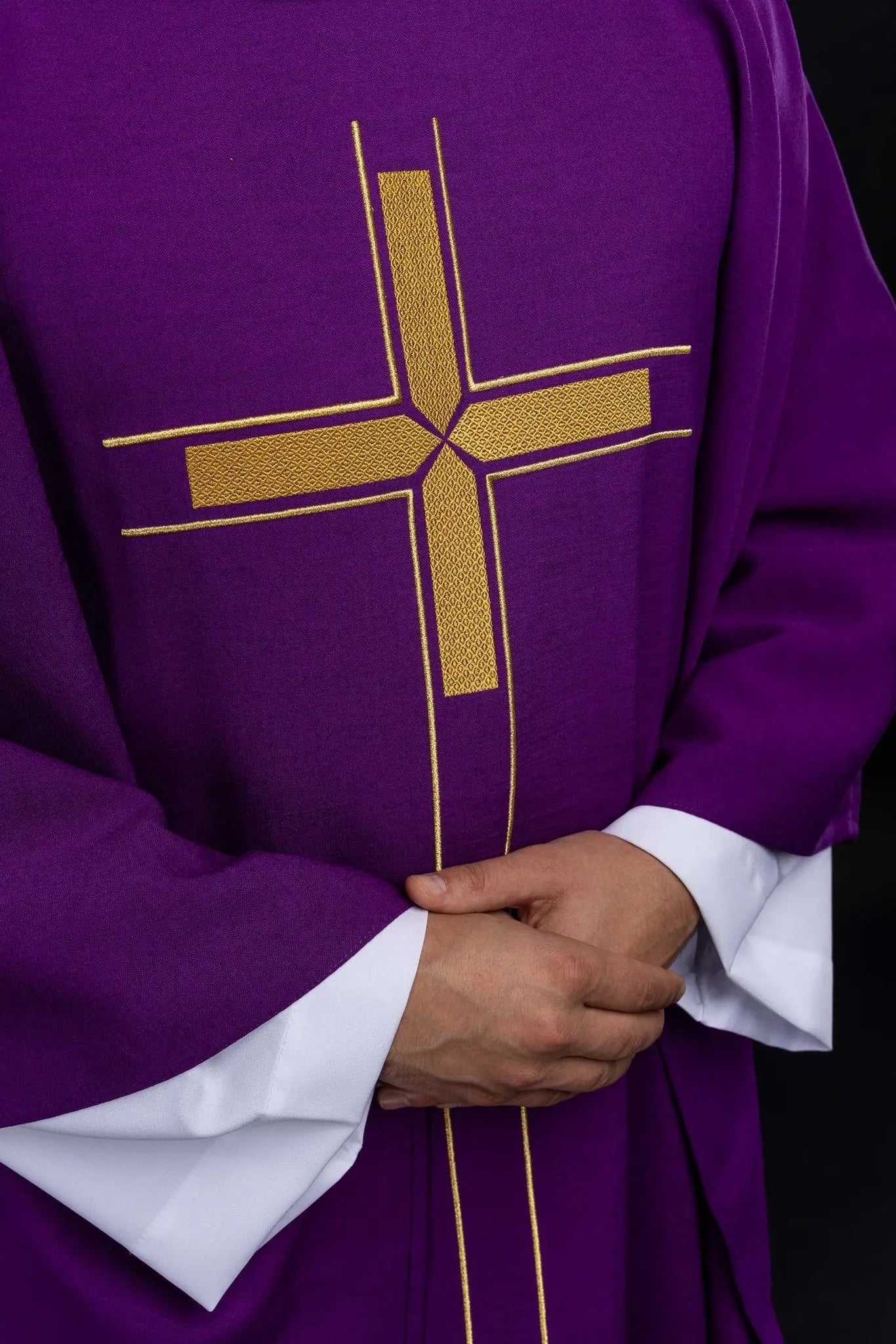Purple chasuble with an embroidered cross motif