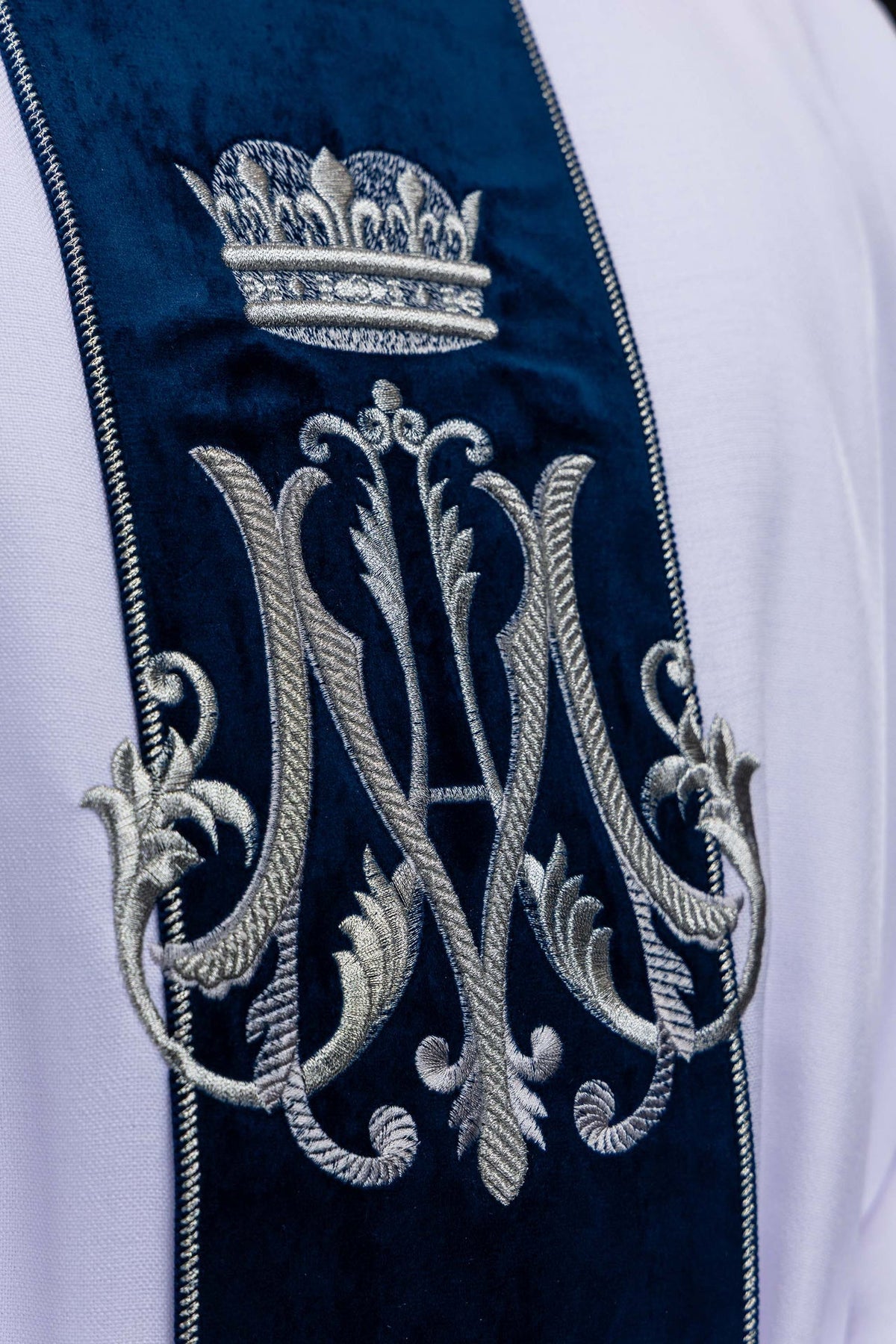 White velvet orphrey with embroidered crowned Marian monogram, detail view