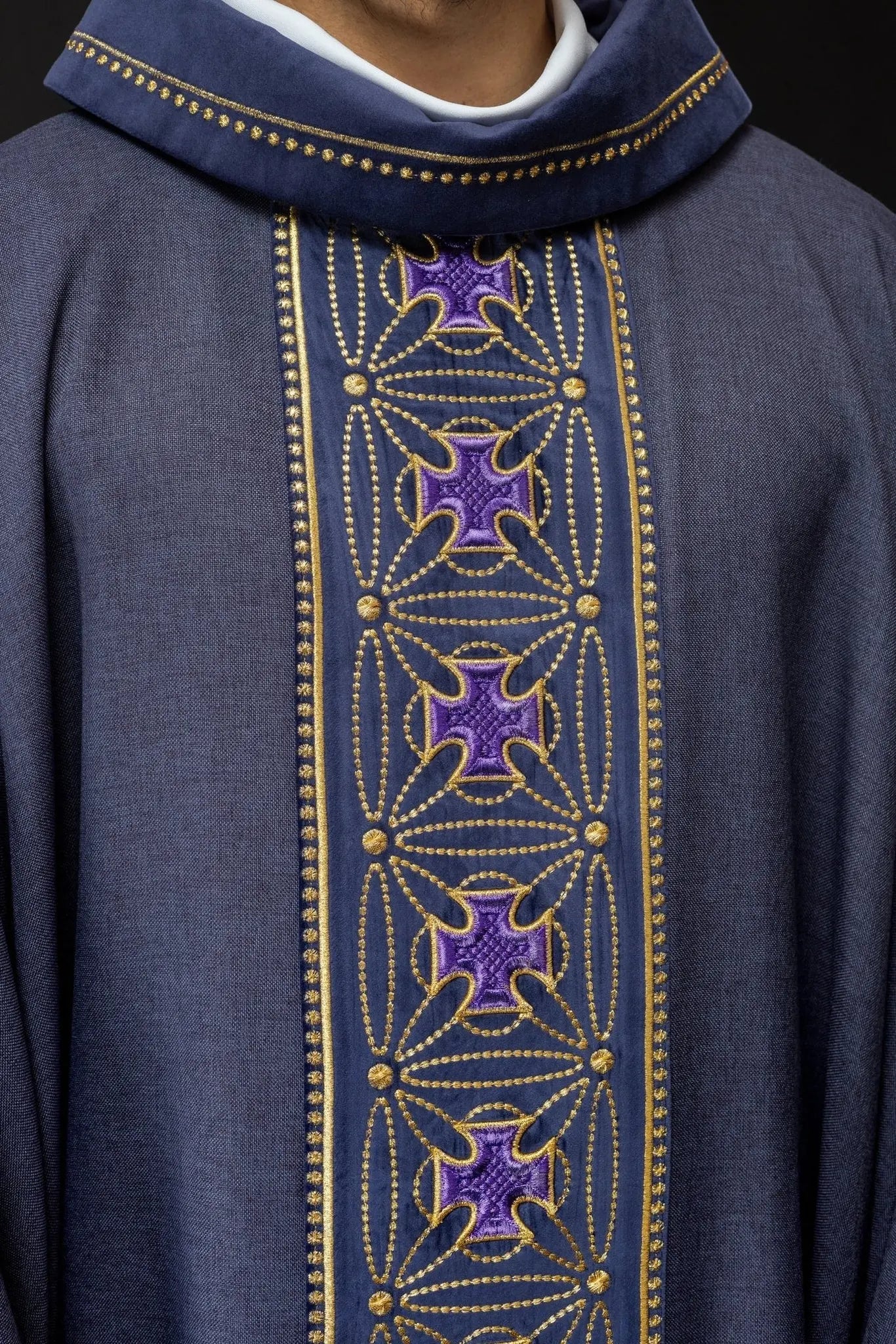 Liturgical chasuble with richly decorated belt with crosses in purple color