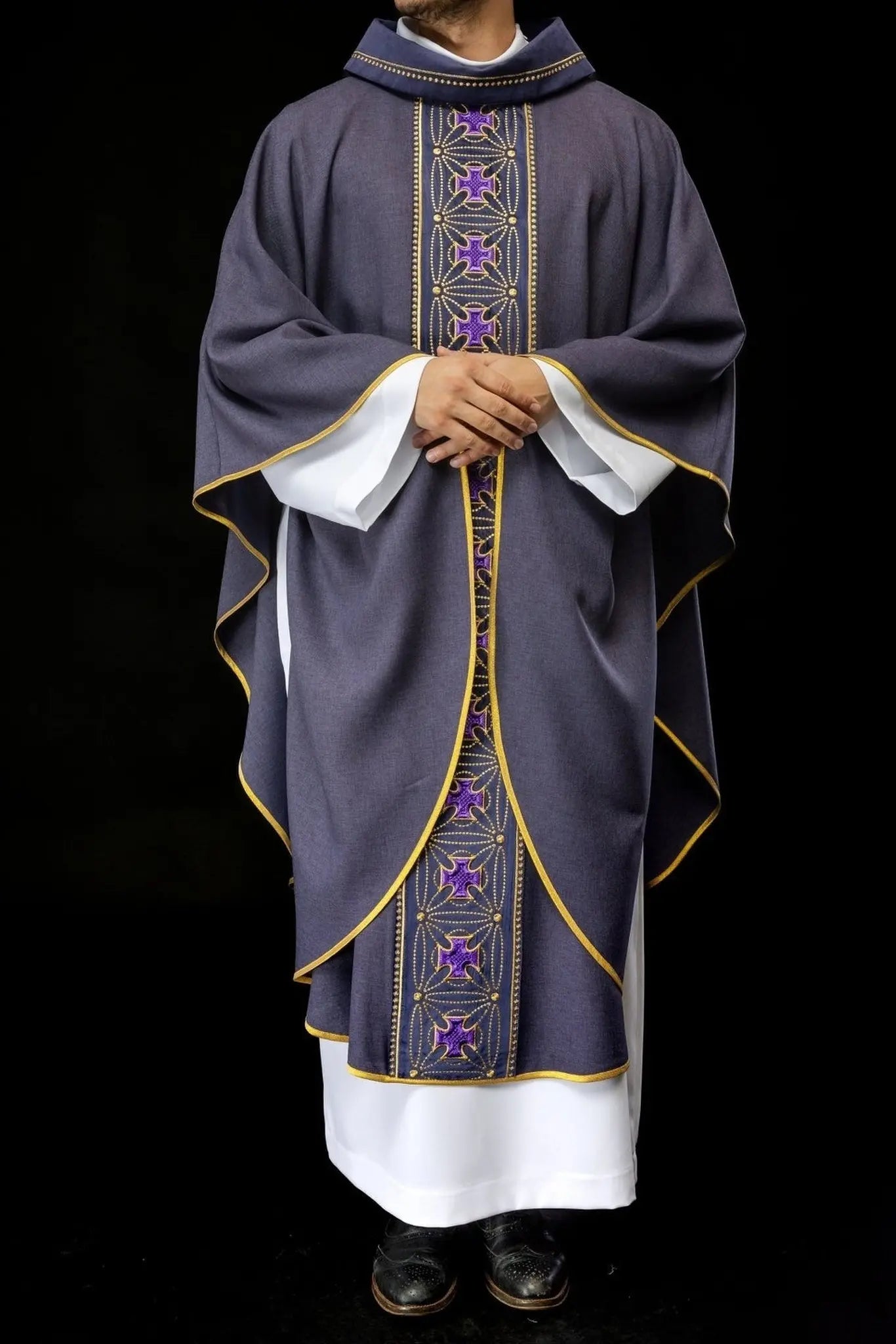 Liturgical chasuble with richly decorated belt with crosses in purple color