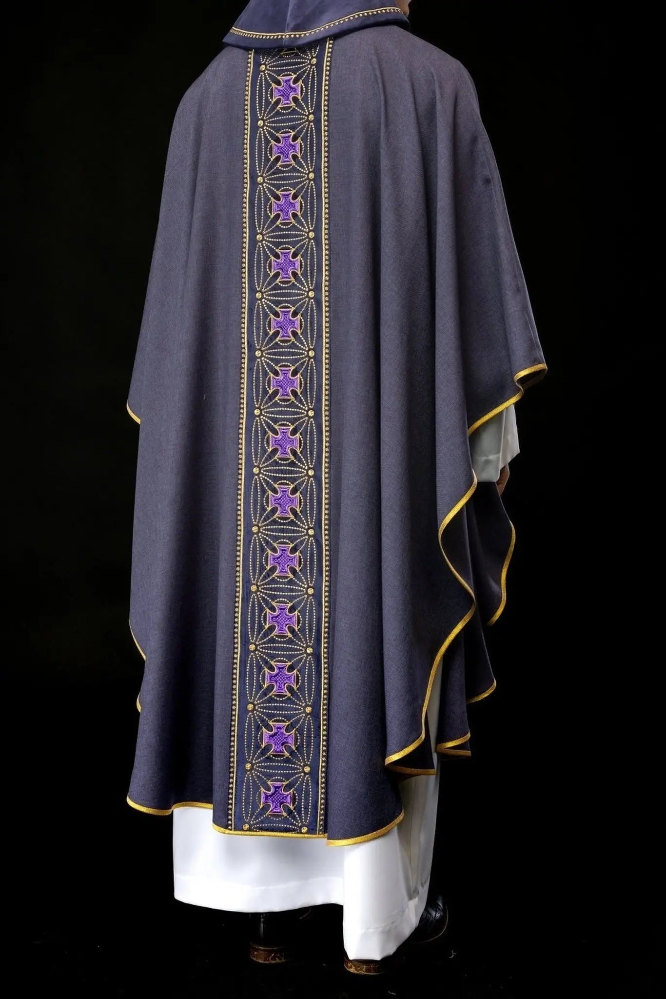 Liturgical chasuble with richly decorated belt with crosses in purple color