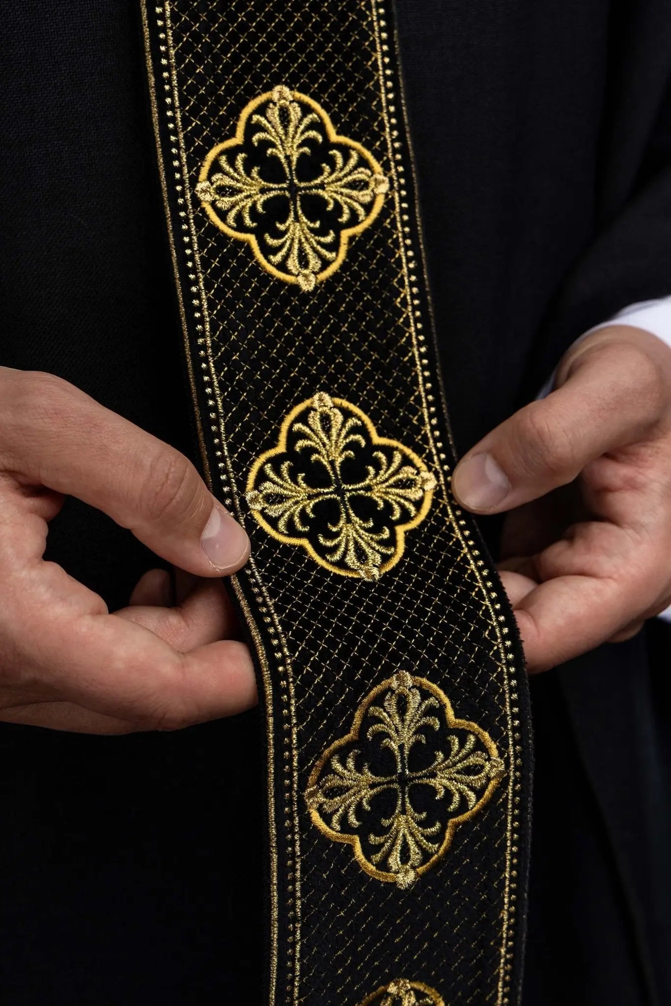 Black chasuble with embroidered band and collar with crosses