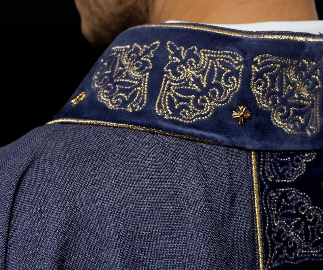 Chasuble with richly embroidered belt and collar in purple