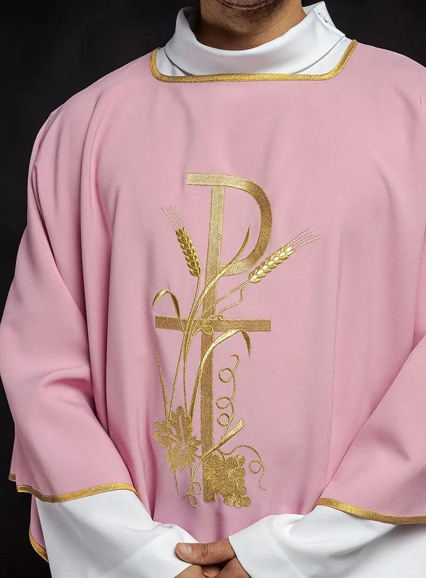 Pink dalmatica with gold Pax cross embroidery